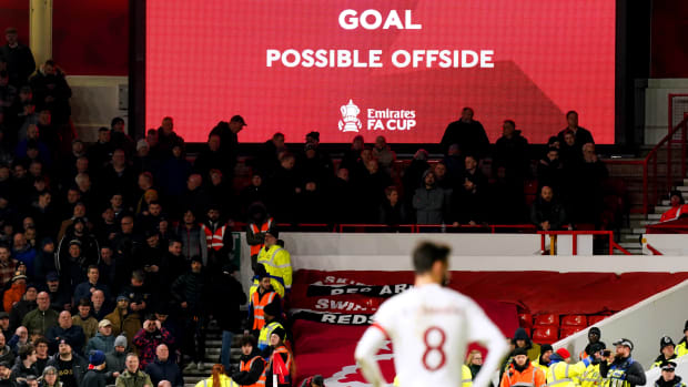 A big screen at the City Ground pictured while a VAR check took place following Casemiro's late goal for Manchester United in a 1-0 win at Nottingham Forest in February 2024